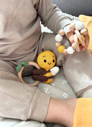 ALT=" Baby and toy"