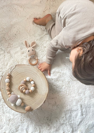 ALT=" Baby and toy"
